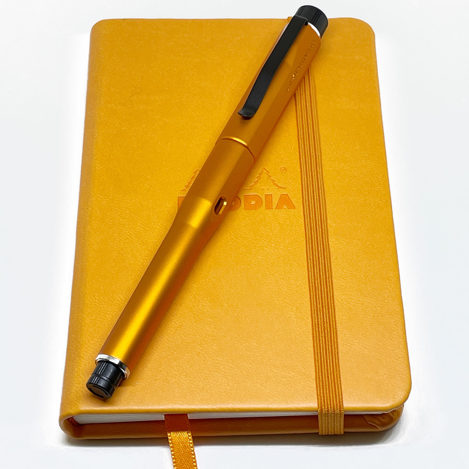 「KURU TOGA DIVE」トワイライトオレンジ RHODIA WEBNOTEBOOK